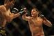 February 4, 2012; Las Vegas, NV, USA; UFC fighter Carlos Condit (left) fights against Nick Diaz (right) during UFC 143 at the Mandalay Bay Events Center. Carlos Codit defeated Nick Diaz. Mandatory Credit: Kelvin Kuo-US PRESSWIRE