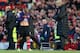 MANCHESTER, ENGLAND - NOVEMBER 03: Arsenal Manager Arsene Wenger looks on as Jack Wilshere of Arsenal heads for the dressing room after being sent off during the Barclays Premier League match between Manchester United and Arsenal at Old Trafford on November 3, 2012 in Manchester, England. (Photo by Alex Livesey/Getty Images)