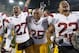 EUGENE, OR - NOVEMBER 19: (L-R) Safety Marshall Jones #27, wide receiver Nic Curry #25 and linebacker Shane Horton #23 of the USC Trojans celebrate after the Trojans upset the Oregon Ducks at Autzen Stadium on November 19, 2011 in Eugene, Oregon. USC won the game 38-35. (Photo by Steve Dykes/Getty Images)