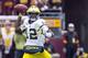 Nov 3, 2012; Minneapolis, MN, USA: Michigan Wolverines quarterback Devin Gardner (12) drops back to throw a pass against the Minnesota Golden Gophers at TCF Bank Stadium. Mandatory Credit: Jesse Johnson-US PRESSWIRE