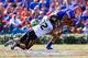 GAINESVILLE, FL - NOVEMBER 03: Jordan Reed #11 of the Florida Gators is tackled by Will Ebner #32 of the Missouri Tigers during the game at Ben Hill Griffin Stadium on November 3, 2012 in Gainesville, Florida. (Photo by Sam Greenwood/Getty Images)