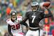 PHILADELPHIA, PA - OCTOBER 28: Quarterback Michael Vick #7 of the Philadelphia Eagles looks to pass on the run as Thomas DeCoud #28 of the Atlanta Falcons chases during a game at Lincoln Financial Field on October 28, 2012 in Philadelphia, Pennsylvania. (Photo by Rich Schultz /Getty Images)