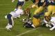 SOUTH BEND, IN - NOVEMBER 03: Cierre Wood #20 of the Notre Dame Fighting Irish fumbles the ball at the goal line in overtime as Lafayette Pitts #2 of the Pittsburgh Panthers moves to make the recovery at Notre Dame Stadium on November 3, 2012 in South Bend, Indiana. Notre Dame defeated Pittsburgh 29-26 in triple overtime. (Photo by Jonathan Daniel/Getty Images)