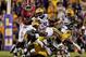 November 3, 2012; Baton Rouge, LA, USA; Alabama Crimson Tide running back T.J. Yeldon (4) breaks a tackle by LSU Tigers linebacker Kevin Minter (46) during the second quarter of a game at Tiger Stadium. Mandatory Credit: Derick E. Hingle-US PRESSWIRE