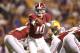 November 3, 2012; Baton Rouge, LA, USA; Alabama Crimson Tide quarterback A.J. McCarron (10) hands the ball off during the first half against the LSU Tigers at Tiger Stadium. Mandatory Credit: Crystal LoGiudice-US PRESSWIRE