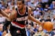 Apr 6, 2012; Dallas, TX, USA; Portland Trail Blazers power forward LaMarcus Aldridge (12) looks to pass the ball against the Dallas Mavericks during the game at the American Airlines Center. The Trailblazers defeated the Mavericks 99-97 in overtime. Mandatory Credit: Jerome Miron-US PRESSWIRE