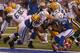 INDIANAPOLIS, IN - OCTOBER 07: John Kuhn #30 of the Green Bay Packers scores a touchdown between Mario Harvey #54 (L) and Antoine Bethea #41 of the Indianapolis Colts at Lucas Oil Stadium on October 7, 2012 in Indianapolis, Indiana. The Colts defeated the Packers 30-27. (Photo by Jonathan Daniel/Getty Images)