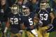 SOUTH BEND, IN - NOVEMBER 03: Everett Golson #5, Braxston Cave #52 and Justin Utupo #53 of the Notre Dame Fighting Irish celebrate after Golson ran for the game-winning touchdown against the Pittsburgh Panthers at Notre Dame Stadium on November 3, 2012 in South Bend, Indiana. Notre Dame defeated Pittsburgh 29-26 in triple overtime. (Photo by Jonathan Daniel/Getty Images)