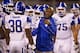 FAYETTEVILLE, AR - OCTOBER 13: Head Coach Joker Phillips of the Kentucky Wildcats calls his team together during a timeout during a game against the Arkansas Razorbacks at Razorback Stadium on October 13, 2012 in Fayetteville, Arkansas. (Photo by Wesley Hitt/Getty Images)