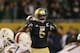 CHICAGO, IL - OCTOBER 06: Manti Te'o #5 of the Notre Dame Fighting Irish calls defensive signals against the Miami Hurricanes at Soldier Field on October 6, 2012 in Chicago, Illinois. Notre Dame defeated Miami 41-3. (Photo by Jonathan Daniel/Getty Images)