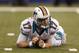 INDIANAPOLIS, IN - NOVEMBER 04: Ryan Tannehill #17 of the Miami Dolphins reacts after losing the ball on a hit by Dwight Freeney #93 of the Indianapolis Colts during the game at Lucas Oil Stadium on November 4, 2012 in Indianapolis, Indiana. (Photo by Joe Robbins/Getty Images)