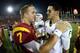 Matt Barkley and Marcus Mariota meet after Saturday's game