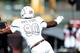 STARKVILLE, MS - NOVEMBER 03: Johnny Manziel #2 of the Texas A&M Aggies avoids a tackle by Denico Autry #90 of the Mississippi State Bulldogs at Wade Davis Stadium on November 3, 2012 in Starkville, Mississippi. (Photo by Stacy Revere/Getty Images)