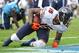 Three touchdowns by Marshall left the Titans on the turf, unable to rise.