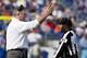 Mike Munchak maybe tries to explain to an official why he should keep his job. It goes as well as most conversations with officials.