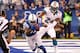 INDIANAPOLIS, IN - NOVEMBER 04: Reggie Wayne #87 of the Indianapolis Colts catches a fist quarter touchdown in front of Sean Smith #24 of the Miami Dolphins at Lucas Oil Stadium on November 4, 2012 in Indianapolis, Indiana. (Photo by Gregory Shamus/Getty Images)