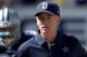 CHARLOTTE, NC - OCTOBER 21: Head coach Jason Garrett of the Dallas Cowboys walks onto the field during their game against the Carolina Panthers at Bank of America Stadium on October 21, 2012 in Charlotte, North Carolina. (Photo by Streeter Lecka/Getty Images)