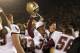 SOUTH BEND, IN - NOVEMBER 2: Wide receiver DuJuan Daniels #32 of the Boston College Eagles celebrates after defeating the Notre Dame University Fighting Irish on November 2, 2002 at Notre Dame Stadium in South Bend, Indiana. Boston College defeated Notre Dame 14-7. (Photo by Elsa/Getty Images)