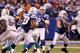 INDIANAPOLIS, IN - NOVEMBER 04: Andrew Luck #12 of the Indianapolis Colts throws a fourth quarter pass while being protected by Mike McGlynn #75 and playing the Miami Dolphins at Lucas Oil Stadium on November 4, 2012 in Indianapolis, Indiana. Indianapolis won the game 23-20. (Photo by Gregory Shamus/Getty Images)