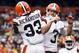 Sep 23, 2012; Cleveland, OH, USA; Cleveland Browns running back Trent Richardson (33) and quarterback Brandon Weeden (3) celebrate a touchdown by Richardson during the second quarter against the Buffalo Bills at Cleveland Browns Stadium. Mandatory Credit: Rick Osentoski-US PRESSWIRE