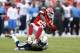 KANSAS CITY, MO - SEPTEMBER 30: Jamaal Charles #25 of the Kansas City Chiefs gets tackled by Eric Weddle #32 of the San Diego Chargers during the game at Arrowhead Stadium on September 30, 2012 in Kansas City, Missouri. (Photo by Joe Robbins/Getty Images)