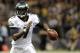 November 5, 2012; New Orleans, LA, USA; Philadelphia Eagles quarterback Michael Vick (7) scrambles out of the pocket looking to pass against the New Orleans Saints during third quarter of their game at the Mercedes-Benz Superdome. Mandatory Credit: John David Mercer-US PRESSWIRE