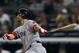 NEW YORK, NY - OCTOBER 03: Cody Ross #7 of the Boston Red Sox hits an RBI single in the first inning against the New York Yankees on October 3, 2012 at Yankee Stadium in the Bronx borough of New York City. (Photo by Elsa/Getty Images)