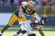 GREEN BAY, WI - OCTOBER 28: Cecil Shorts III #84 of the Jacksonville Jaguars is tackled by Clay Matthews #52 of the Green Bay Packers during the NFL game at Lambeau Field on October 28, 2012 in Green Bay, Wisconsin. (Photo by Andy Lyons/Getty Images)