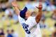 LOS ANGELES, CA - AUGUST 20: WWE Superstar John Cena throws the ceremonial first pitch for the Los Angeles Dodgers as they play the Chicago Cubs on August 20, 2009 at Dodger Stadium in Los Angeles, California. (Photo by Jacob de Golish/Getty Images)