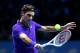 LONDON, ENGLAND - NOVEMBER 06: Roger Federer of Switzerland hits a backhand during the men's singles match against Janko Tipsarevic of Serbia on day two of the ATP World Tour Finals at the O2 Arena on November 6, 2012 in London, England. (Photo by Julian Finney/Getty Images)