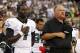 PHILADELPHIA, PA - AUGUST 09: Michael Vick #7 and head coach Andy Reid of the Philadelphia Eagles observe a moment of silence in memory of Reid's son Garrett before a preseason game against the Pittsburgh Steelers at Lincoln Financial Field on August 9, 2012 in Philadelphia, Pennsylvania. (Photo by Jeff Zelevansky/Getty Images)
