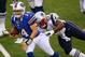 ORCHARD PARK, NY - SEPTEMBER 30: Ryan Fitzpatrick #14 of the Buffalo Bills is tackled by Dont'a Hightower #54 of the New England Patriots during an NFL game at Ralph Wilson Stadium on September 30, 2012 in Orchard Park, New York. (Photo by Tom Szczerbowski/Getty Images)