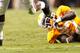 KNOXVILLE, TN - OCTOBER 20: Eddie Lacy #42 of the Alabama Crimson Tide breaks a tackle by Justin Coleman #27 of the Tennessee Volunteers at Neyland Stadium on October 20, 2012 in Knoxville, Tennessee. (Photo by Kevin C. Cox/Getty Images)