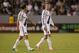 CARSON, CA - NOVEMBER 04: David Beckham #23 and Landon Donovan #10 of the Los Angeles Galaxy walk toward midfield after a brief break in play during the second half of the first leg of the MLS Western Conference Semifinal match at The Home Depot Center on November 4, 2012 in Carson, California. The Earthquakes defeated the Galaxy 1-0. (Photo by Victor Decolongon/Getty Images)