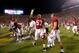 November 3, 2012; Baton Rouge, LA, USA; Alabama Crimson Tide defensive lineman D.J. Pettway (57) and quarterback Phillip Ely (12) celebrate defeating the LSU Tigers 21-17 at Tiger Stadium. Mandatory Credit: Crystal LoGiudice-US PRESSWIRE