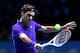 LONDON, ENGLAND - NOVEMBER 06: Roger Federer of Switzerland hits a backhand during the men's singles match against Janko Tipsarevic of Serbia on day two of the ATP World Tour Finals at the O2 Arena on November 6, 2012 in London, England. (Photo by Julian Finney/Getty Images)