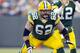 Dec 11, 2011; Green Bay, WI, USA; Green Bay Packers guard Evan Dietrich-Smith (62) blocks during the game against the Oakland Raiders at Lambeau Field. The Packers defeated the Raiders 46-16. Mandatory Credit: Jeff Hanisch-US PRESSWIRE