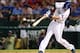 ARLINGTON, TX - AUGUST 20: Josh Hamilton #32 of the Texas Rangers hits a single against the Baltimore Orioles at Rangers Ballpark in Arlington on August 20, 2012 in Arlington, Texas. (Photo by Ronald Martinez/Getty Images)