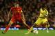 LIVERPOOL, ENGLAND - OCTOBER 25: Samuel Eto'o of Fc Anji Makhachkala competes with Steven Gerrard of Liverpool during the UEFA Europa League Group A match between Liverpool FC and FC Anzhi Makhachkala at Anfield on October 25, 2012 in Liverpool, England. (Photo by Clive Brunskill/Getty Images)