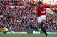 MANCHESTER, ENGLAND - NOVEMBER 03: Robin van Persie of Manchester United shoots during the Barclays Premier League match between Manchester United and Arsenal at Old Trafford on November 3, 2012 in Manchester, England. (Photo by Alex Livesey/Getty Images)