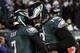PHILADELPHIA, PA - DECEMBER 28: Michael Vick #7 is congratulated by Todd Herremans #of the Philadelphia Eagles after scoring a touchdown against the Minnesota Vikings at Lincoln Financial Field on December 28, 2010 in Philadelphia, Pennsylvania. (Photo by Jim McIsaac/Getty Images)