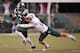 ATHENS, OH - NOVEMBER 1: Mycal Swaim #26 of the Eastern Michigan Eagles brings down Donte Foster #3 of the Ohio Bobcats after a gain on a pass reception at Peden Stadium on November 1, 2012 in Athens, Ohio. Ohio defeated Eastern Michigan 45-14. (Photo by Jamie Sabau/Getty Images)
