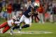 Nov 1, 2012; San Diego, CA, USA; San Diego Chargers wide receiver Danario Alexander (84) runs after catching a 20 yard pass during the third quarter while defended by Kansas City Chiefs defensive back Travis Daniels (34) at Qualcomm Stadium. Mandatory Credit: Jake Roth-US PRESSWIRE