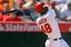 ANAHEIM, CA - SEPTEMBER 13: Torii Hunter #48 of the Los Angeles Angels of Anaheim watches the ball go over the right field wall for a solo homerun in the seventh inning agianst the Oakland Athletics during the MLB game at Angel Stadium of Anaheim on September 13, 2012 in Anaheim, California. (Photo by Victor Decolongon/Getty Images)