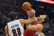 January. 20, 2010; Portland, OR, USA; Portland Trail Blazers small forward Nicolas Batum (88) fouls Los Angeles Clippers power forward Blake Griffin (32) during the first quarter of the game at the Rose Garden. Mandatory Credit: Steve Dykes-US PRESSWIRE