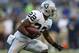 SEATTLE, WA - AUGUST 30: Running back Taiwan Jones #22 of the Oakland Raiders rushes against the Seattle Seahawks at CenturyLink Field on August 30, 2012 in Seattle, Washington. (Photo by Otto Greule Jr/Getty Images)