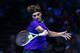 LONDON, ENGLAND - NOVEMBER 08: Roger Federer of Switzerland hits a forehand during the men's singles match against David Ferrer of Spain on day four of the ATP World Tour Finals at the O2 Arena on November 8, 2012 in London, England. (Photo by Julian Finney/Getty Images)