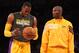 LOS ANGELES, CA - OCTOBER 21: Dwight Howard #12 (L) and Kobe Bryant #24 of the Los Angeles Lakers talks as they warm up to play the Sacramento Kings at Staples Center on October 21, 2012 in Los Angeles, California. NOTE TO USER: User expressly acknowledges and agrees that, by downloading and or using this photograph, User is consenting to the terms and conditions of the Getty Images License Agreement. (Photo by Stephen Dunn/Getty Images)