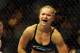August 18, 2012; San Diego, CA, USA; Ronda Rousey (black shirt) as she defeated Sarah Kaufman (blue shirt)during their Strikeforce MMA women's bantamweight title bout at the Valley View Casino Center. Rousey won in 54 seconds of the first round. Mandatory Credit: Jayne Kamin-Oncea-US PRESSWIRE