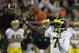 CHAMPAIGN, IL - NOVEMBER 12: Devin Gardner #7 of the Michigan Wolverines throws a touchdown pass against the Illinois Fighting Illini at Memorial Stadium on November 12, 2011 in Champaign, Illinois. Michigan defeated Illinois 31-14. (Photo by Jonathan Daniel/Getty Images)